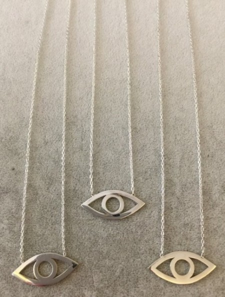 Minimalist gold evil eye necklace with an open-eye design, made from 925 sterling silver, featuring a sleek and elegant look.