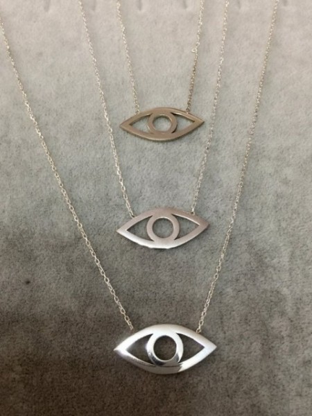 Minimalist gold evil eye necklace with an open-eye design, made from 925 sterling silver, featuring a sleek and elegant look.