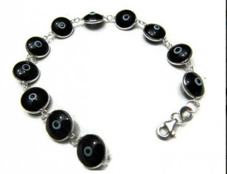 Black evil eye bracelet with handmade beads and sterling silver links, representing Turkish tradition and elegance, ideal for wholesale buyers.