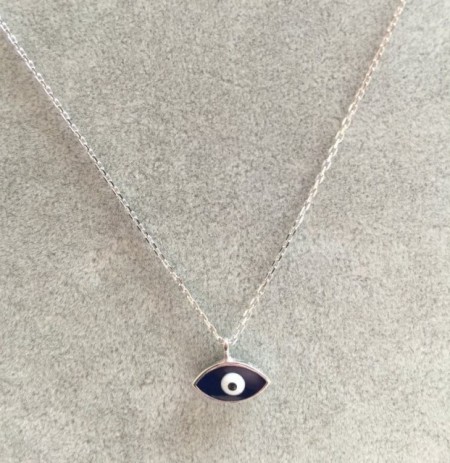 Black evil eye mini necklace with a sterling silver chain and sleek pendant design.