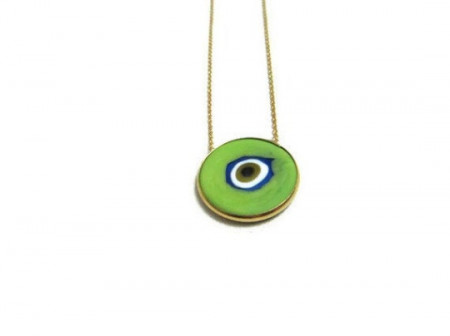 Green round evil eye pendant necklace crafted in sterling silver with a minimalist gold chain design.