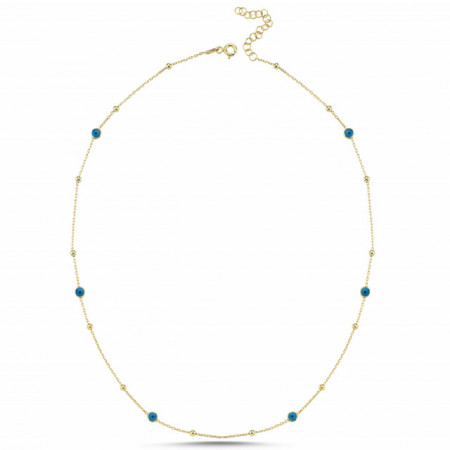 Gold-plated sterling silver necklace adorned with small blue evil eye charms, designed for elegance and spiritual significance.