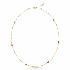 Gold-plated sterling silver necklace with red evil eye charms, combining bold style with spiritual significance.