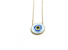 Round white evil eye pendant necklace in sterling silver with a minimalist gold chain design.