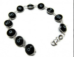 Black evil eye bracelet with handmade beads and sterling silver links, representing Turkish tradition and elegance, ideal for wholesale buyers.