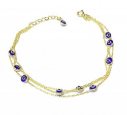 Gold-plated multi-layer bracelet with blue evil eye charms on delicate chains, combining elegance and symbolic protection.