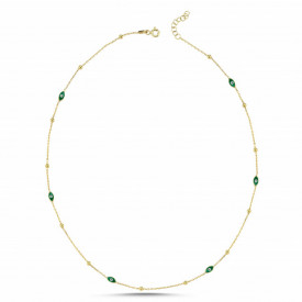 Gold-plated sterling silver necklace with vibrant green evil eye charms, symbolizing elegance and positive energy.