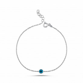 Minimalist evil eye charm bracelet in sterling silver for protection and elegance.