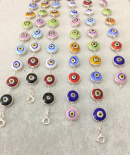 Multicolor evil eye bracelet with sterling silver links, featuring handcrafted Turkish design and vibrant glass beads, perfect for wholesale jewelry collections.