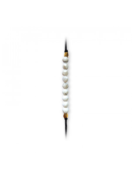 Bratara ajustabila cu 9 sfere din Howlit, talisman pentru Calm