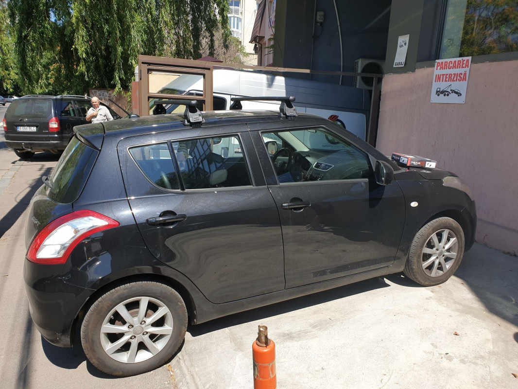 Suzuki Swift bare transversale Menabo Tema