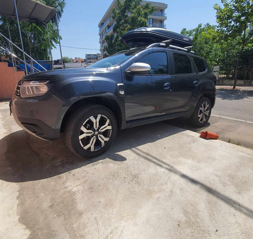 Dacia Duster bare transversale Menabo Brio si cutie portbagaj Menabo Marathon
