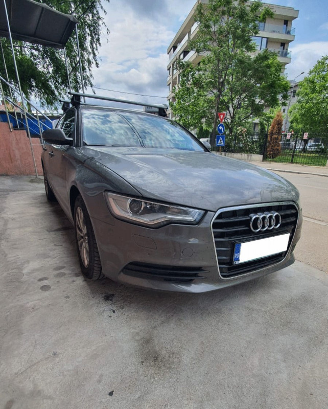 Audi A6 bare transversale Thule EvoClamp Silver