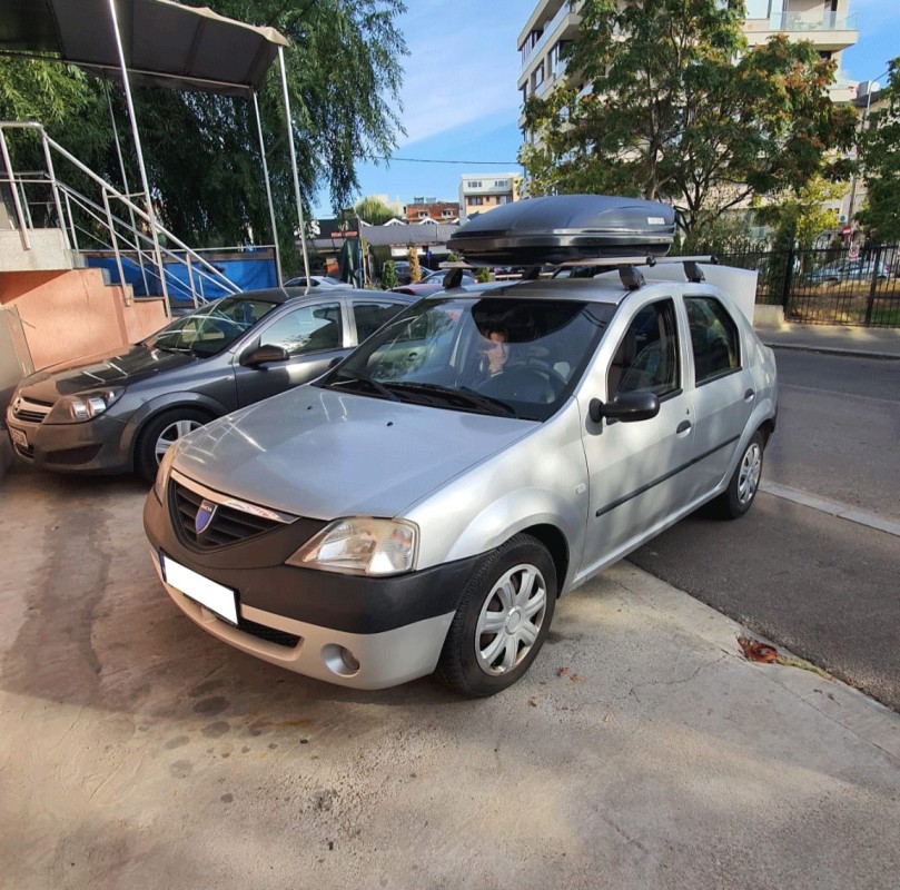 Dacia Logan sedan cu bare transversale Menabo Tema si cutie portbagaj Menabo Marathon 320