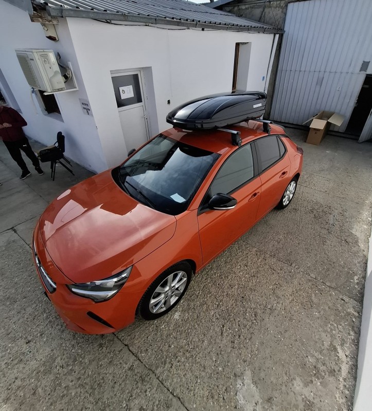 Opel Corsa bare transversale Menabo Tema si cutie portbagaj Menabo Mania 400