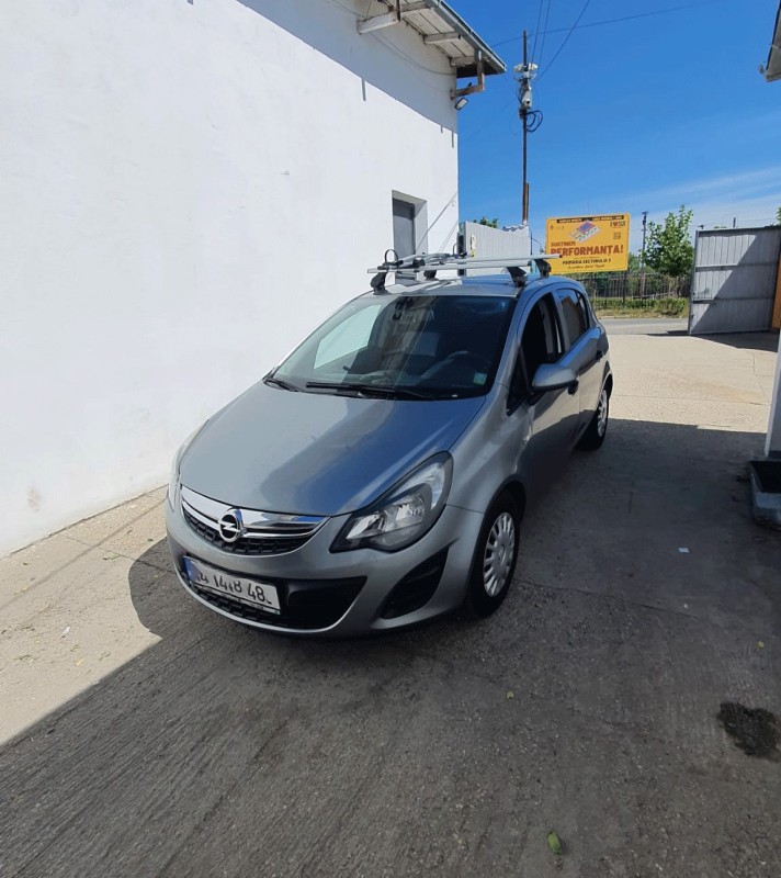 Opel Corsa bare transversale Menabo Omega Plus si suport bicicleta Thule FreeRide 532