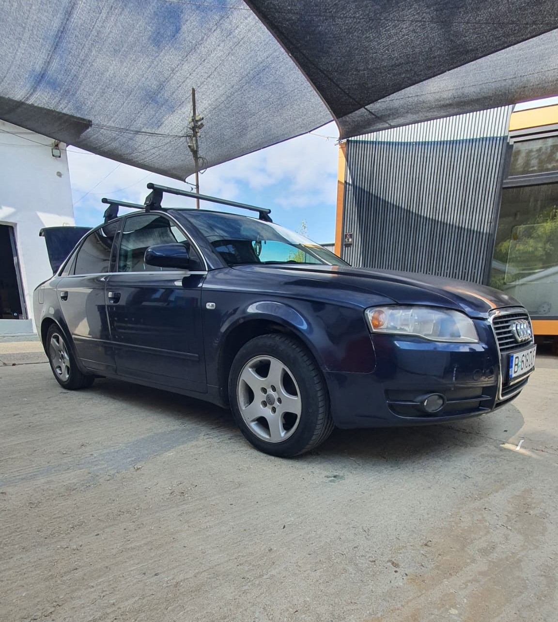 Audi A4 bare portbagaj Menabo Tema aluminiu