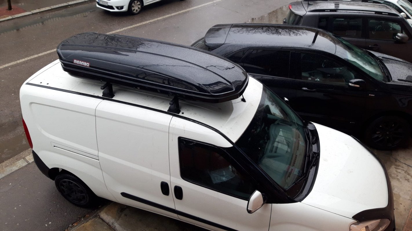 Fiat Doblo with K39 roof bars and a Menabo Mania roof box