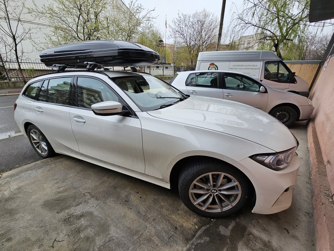 BMW 3 Series with K39 King roof bars and a Menabo Mania roof box