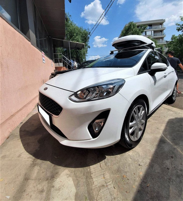 Ford Fiesta with Menabo Tema roof bars and a Menabo Mania roof box