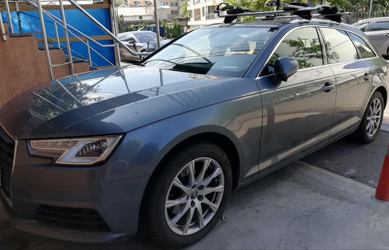 Audi bare transversale Menabo Leopard Silver si suport bicicleta Thule Freeride