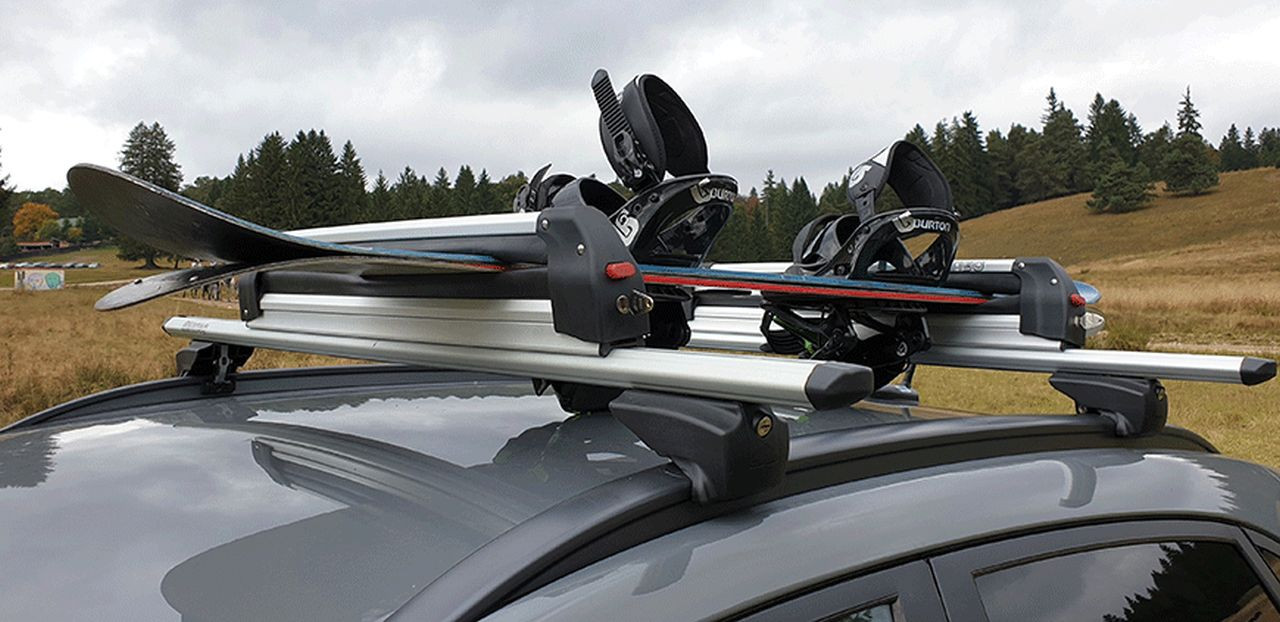 Suport schi si snowboard pe bare transversale. Cum se monteaza eficient?