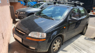 Chevrolet Aveo bare transversale Menabo Delta si suporturi bicicleta Thule FreeRide 532