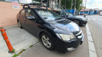 Honda Civic bare transversale Menabo Delta si suporturi de bicicleta Thule FreeRide 532