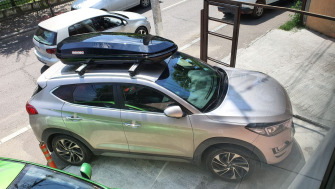 Hyundai Tucson bare transversale Menabo Leopard si cutie portbagaj Menabo Diamond