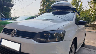 Volkswagen Polo bare transversale Menabo Tema si cutie portbagaj Menabo Mania