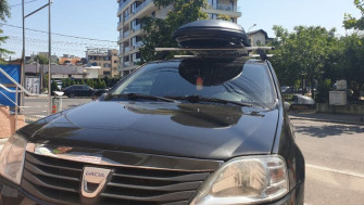 Dacia Logan bare transversale Menabo Tema si cutie portbagaj Menabo Marathon