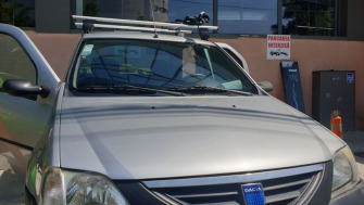 Dacia Logan bare transversale Menabo Delta si suport bicicleta Thule FreeRide