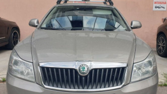 Skoda Octavia bare transversale Menabo Tema si suport bicicleta Menabo Iron
