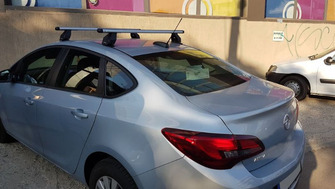 Opel Astra J bare transversale Menabo Tema