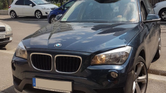 BMW X1 bare transversale Menabo Tema si cutie portbagaj Menabo Mania