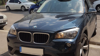 BMW X1 bare transversale Menabo Tema si cutie portbagaj Menabo Mania