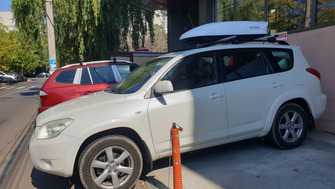 Toyota RAV 4 bare transversale Menabo Jackson Silver si cutie portbagaj Menabo Mania