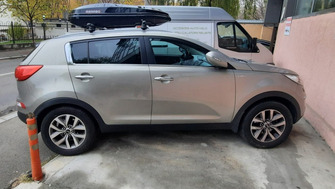 Kia Sportage bare transversale Menabo Tiger si cutie portbagaj Menabo Diamond