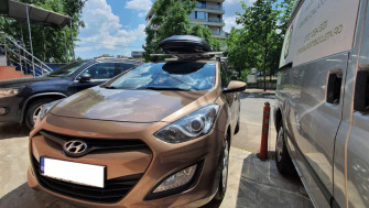 Hyundai i30 bare transversale Menabo Tema si cutie portbagaj Menabo Marathon