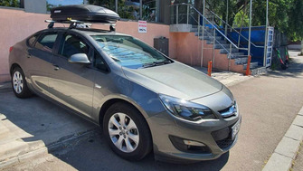 Opel Astra bare transversale Menabo Tema si cutie portbagaj Menabo Marathon