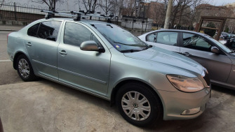 Skoda Octavia bare transversale Menabo Tema si suporturi de bicicleta Thule FreeRide 532