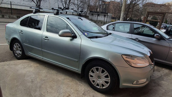Skoda Octavia bare transversale Menabo Tema si suporturi de bicicleta Thule FreeRide 532