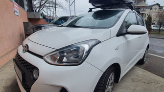 Hyundai i10 bare transversale Menabo Tema si cutie portbagaj Menabo Marathon 400