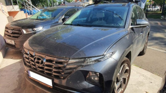 Hyundai Tucson bare transversale Menabo Leopard si suporturi de bicicleta Thule FreeRide 532