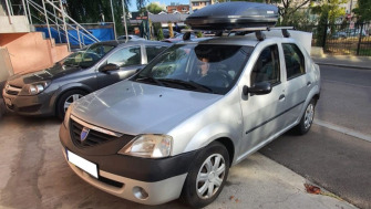 Dacia Logan bare transversale Menabo Tema si cutie portbagaj Menabo Marathon