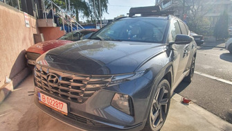 Hyundai Tucson bare transversale Menabo Leopard Black si suport schi si snowboard Menabo Silver Ice Black