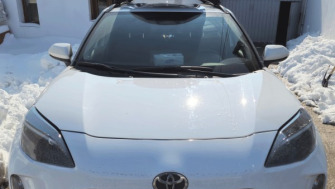 Toyota Yaris Cross bare transversale Menabo Tiger si cutie portbagaj Menabo Satelite 330