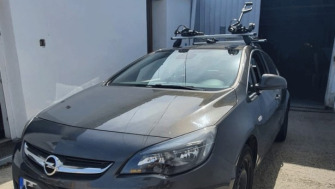 Opel Astra bare transversale Menabo Tema si suporturi de bicicleta Thule ProRide 598