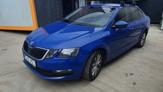 Skoda Octavia bare transversale Menabo Delta Black si suport bicicleta Thule FreeRide 532
