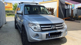 Mitsubishi Pajero bare portbagaj Thule Evo Raised Black